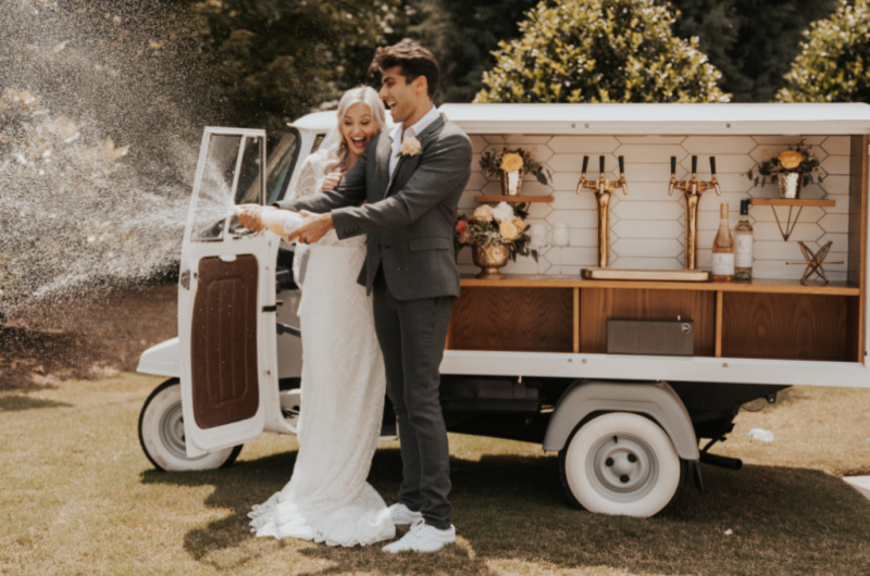 A Playful Romance Styled Shoot champagne truck A Playful Romance Styled Shoot champagne truck