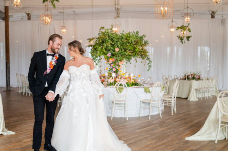 Styled Shoots By Southern Bride Cedar Room Charleston South Carolina couple walking Styled Shoots By Southern Bride Cedar Room Charleston South Carolina couple walking