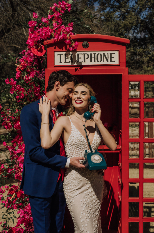 The Rock House Trendsetter Award The Styled Challenge Austin Parvinder couple embrace telephone booth