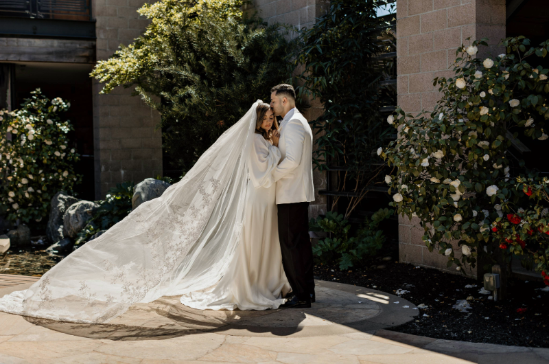 bardessono styled shoot couple embrace in garden bardessono styled shoot couple embrace in garden
