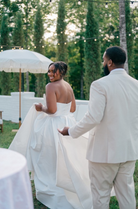 Costal Garden Party Nashville Tennessee Holding Gown