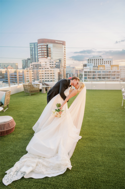 the conrad nasvhille luxury in downtown music city couple kiss on patio