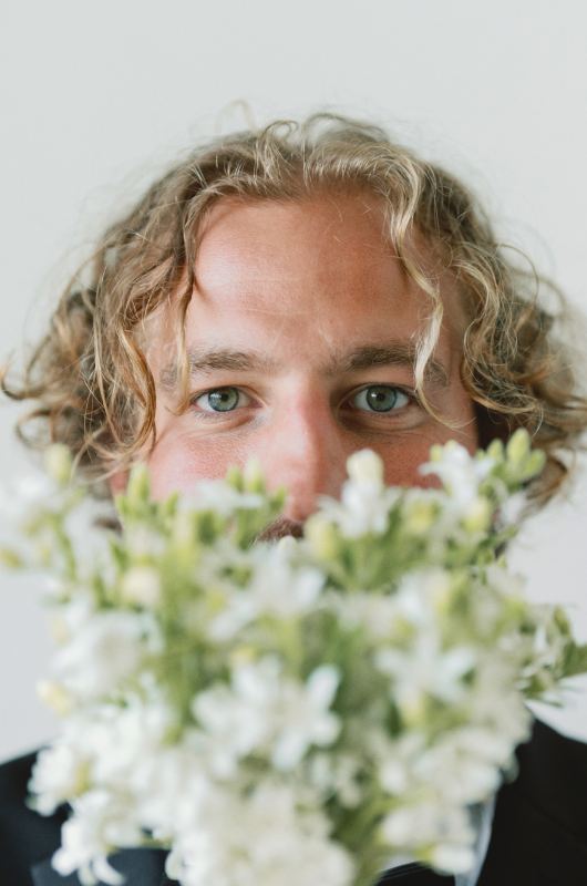 Timeles Elegance A Classic Blue and White Chinoiserie Inspired Styled Shoot in Boerne TX groom and flowers