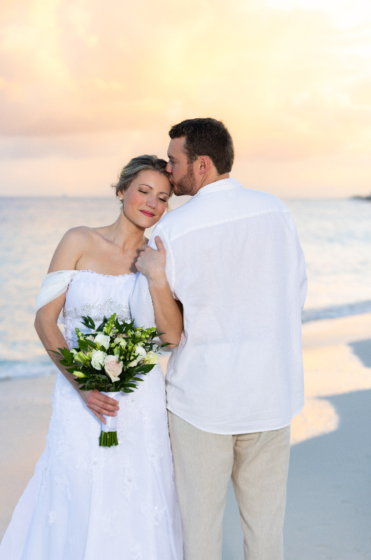 carribbean-paradise-aurora-anguilla-resort-and-golf-club-couple-on-the-beach