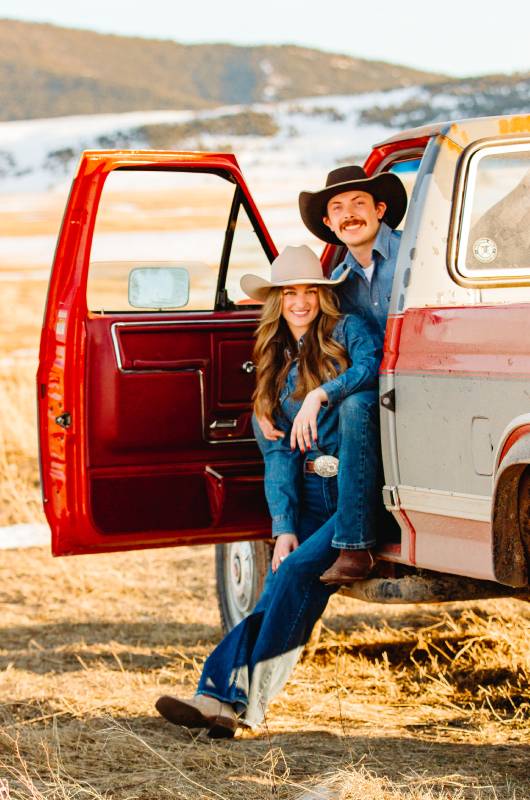 southern belle meets montana cowboy keagan carolines snowy mountain engagement in the car