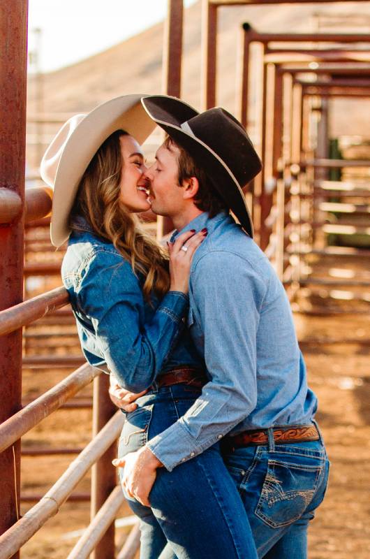 southern belle meets montana cowboy keagan carolines snowy mountain engagement lean in kiss
