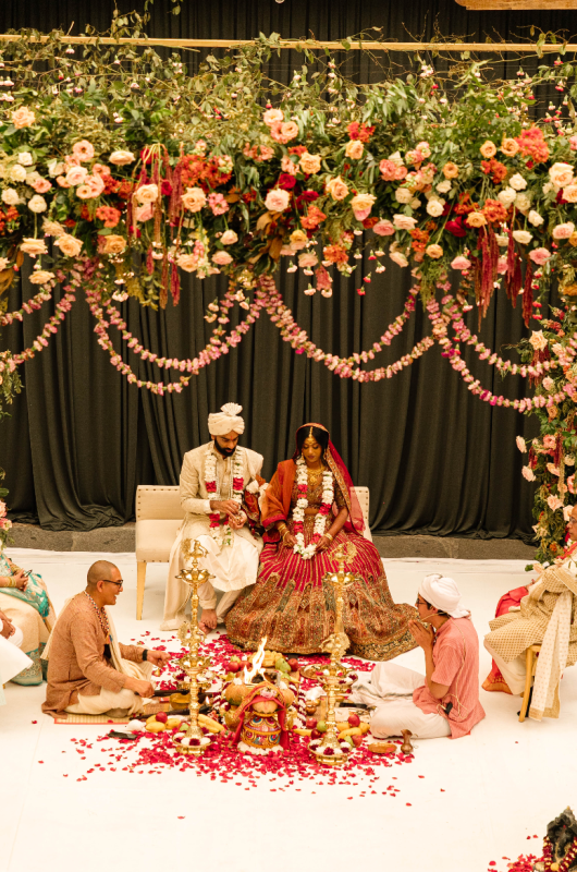 Magic in the City Traditional Indian Weddings at Andaz Mexico City outdoor ceremony bride and groom sitting